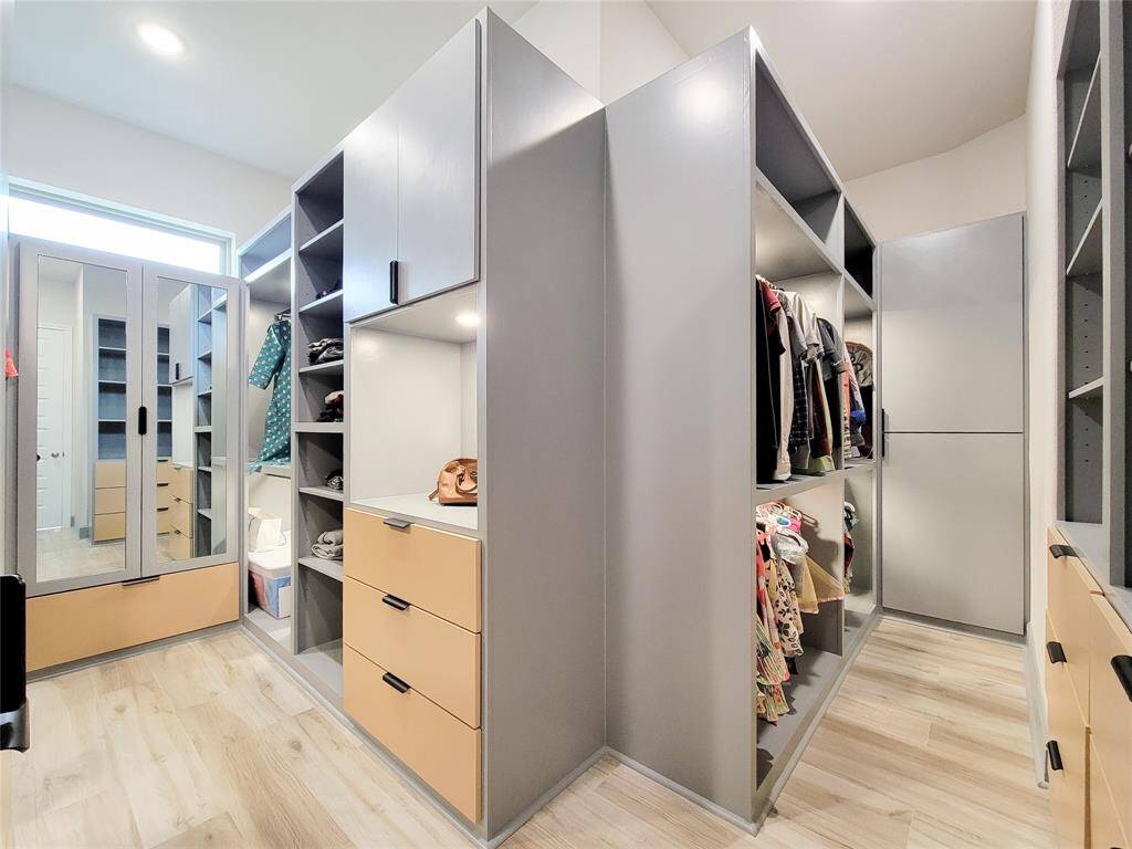 Looking for a well-organized closet space, then here it is...California style built-in closets in Primary suite.