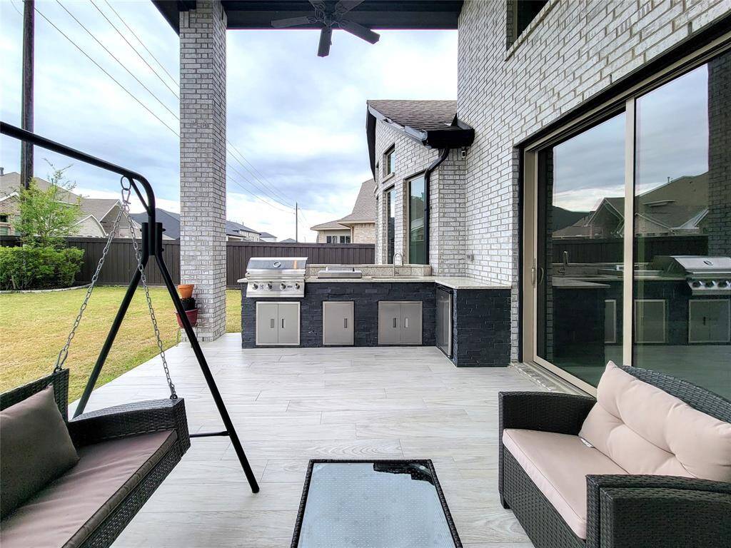 Another view of the relaxing Patio. Note the 3-panel sliding door. Comes handy when you plan to entertain & have company!