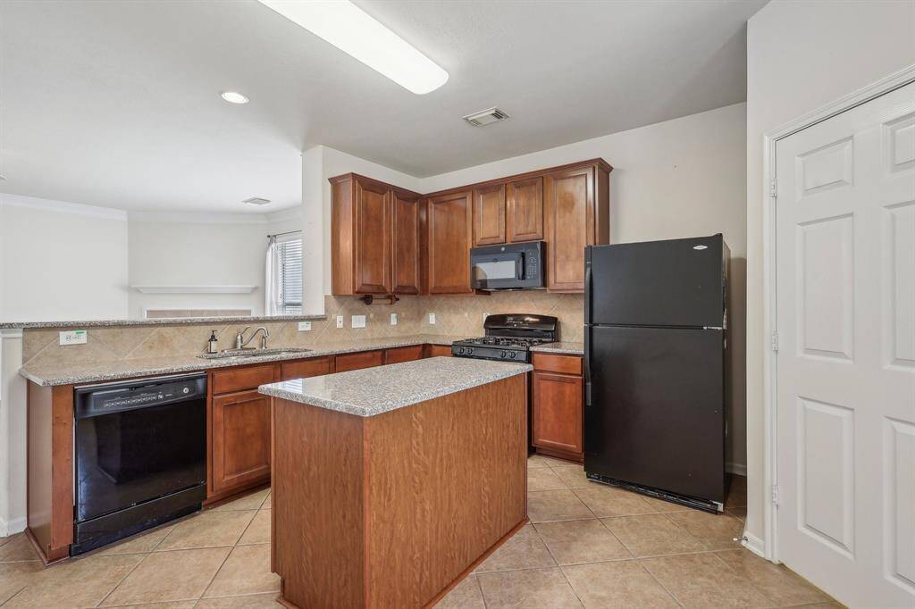 Spacious kitchen with island.