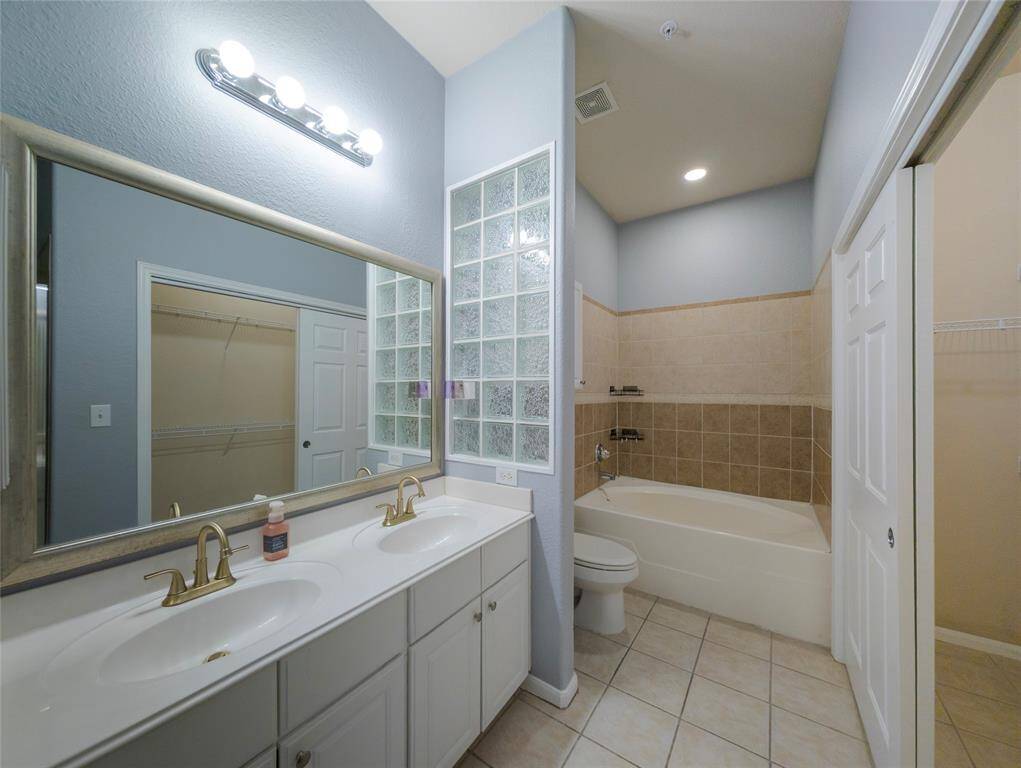 Primary bathroom with a dual vanity