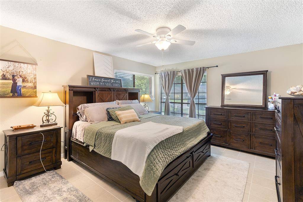 For cooking enthusiasts, a gas line was added prior to the addition of the stainless steel gas range/oven, offering enhanced cooking control and efficiency in this functional, well-equipped kitchen.