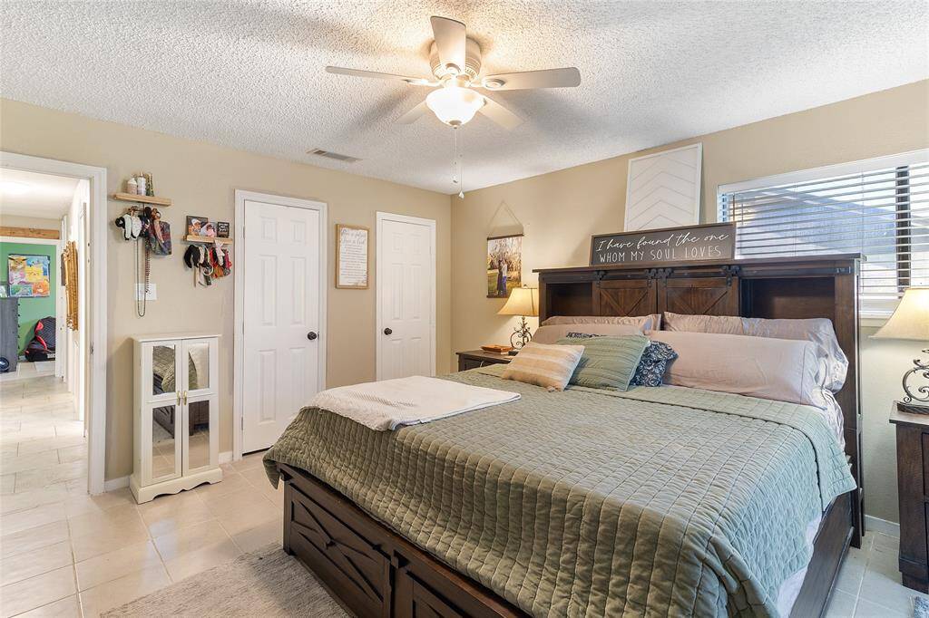 Welcome guests in style with this inviting front entry, where freshly painted paneling adds a crisp, modern touch and sets the tone for the updated charm found throughout the home.