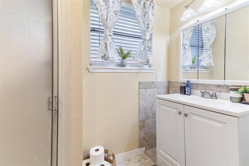 Enjoy the convenience of dual closets in the spacious primary bedroom, offering plenty of storage and functionality without compromising comfort or style.