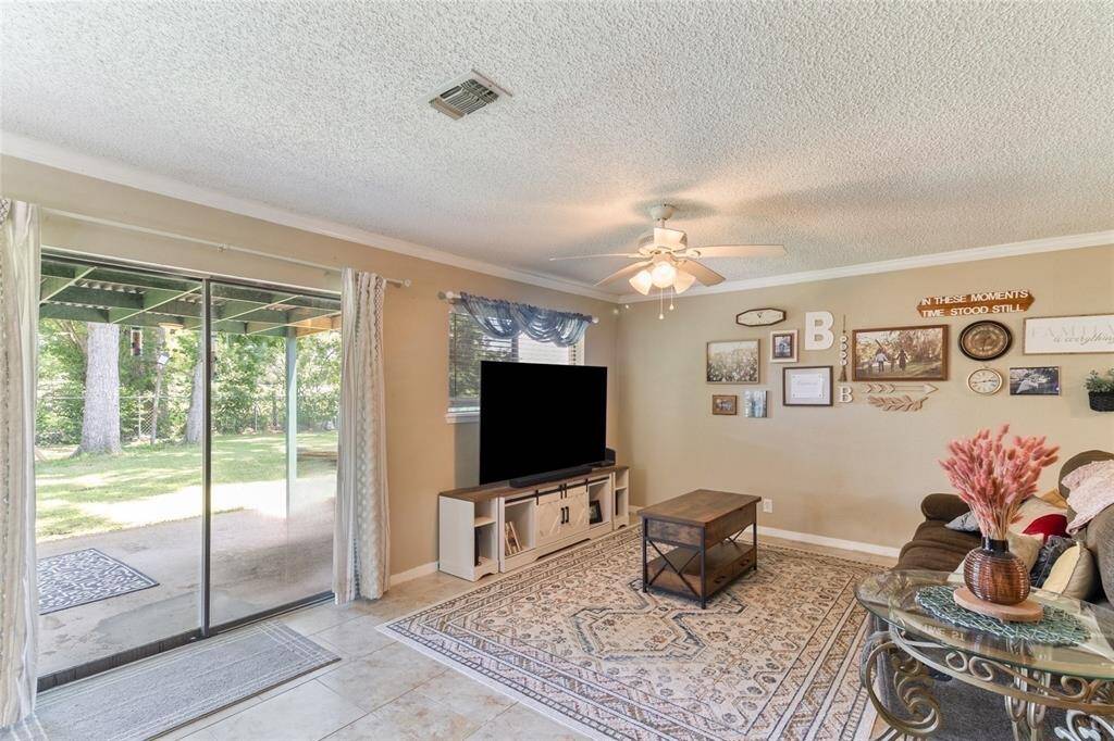 Step inside to an inviting open-concept layout where the dining space (17x15) connects seamlessly to the kitchen and family room.