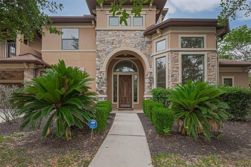 Impressive 5-bedroom, 4.5-bath custom home with a 3-car garage, built by renowned Partners in Building in the coveted Rose Creek section of Fall Creek.