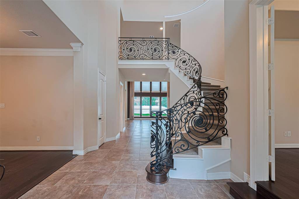 To the right of the foyer is the study and to the left is the dining room. Foyer does have a hall closet and has great sight lines to the two story windows in the family room.
