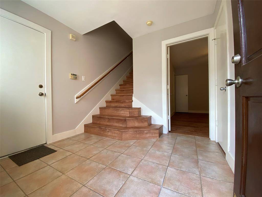 Welcome home! The entry foyer is nicely sized and offers a coat closet.