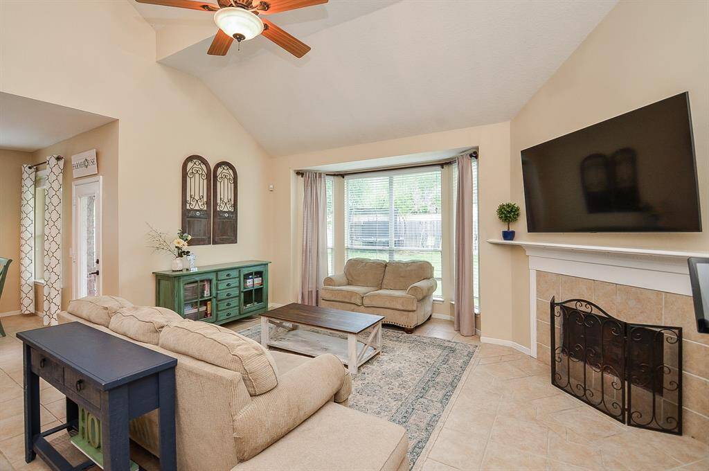 Impressive fireplace bringing warmth to this grand sized family area.  Gas connection for ease or wood burning for the family who wants to hear the "crackle and pop" of wood burning.