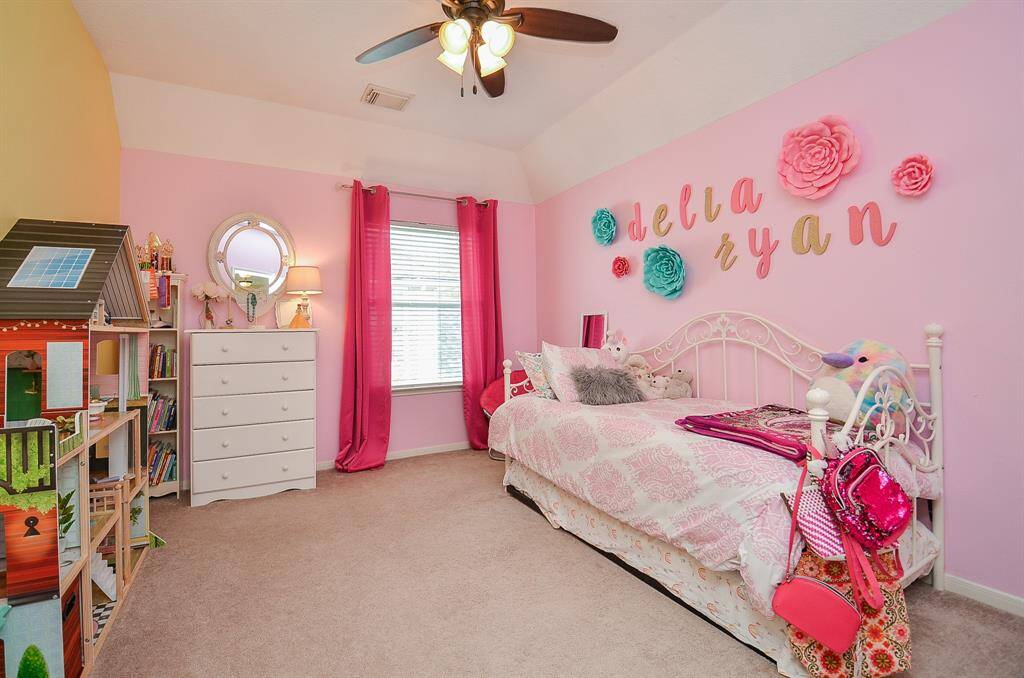 Bedroom 3 is huge and has a massive walk in closet.