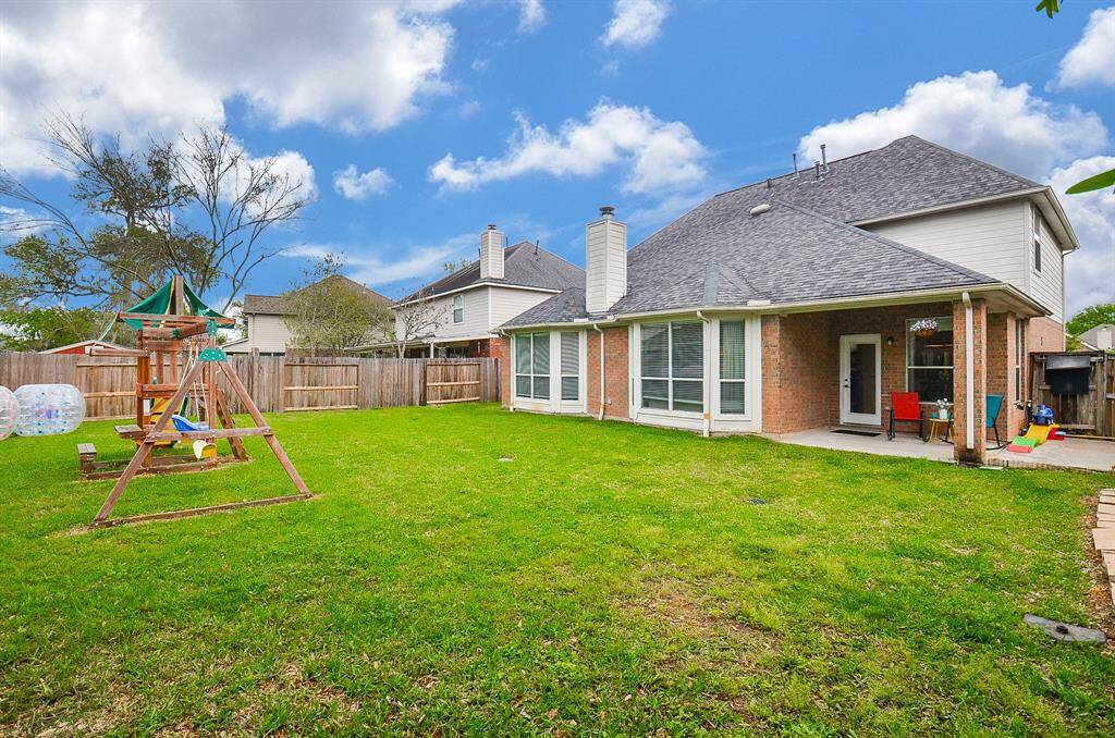 Huge backyard.  Big enough for a pool, playscape, trampoline, volleyball, baseball game or soccer.  Create your families perfect yard.