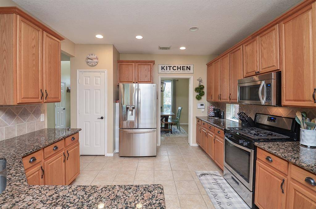 YES! Large, open and updated.  Stainless appliances, granite counters, beautiful tile.  Plenty of room for all the cooks and helpers in the kitchen.
