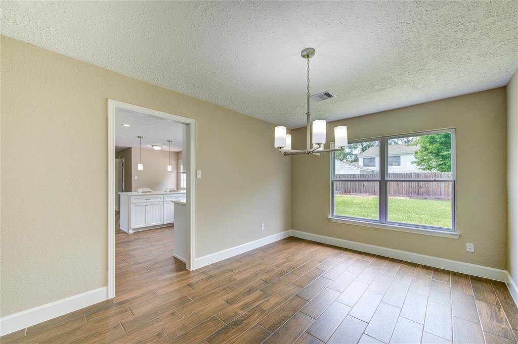 Charming dinning room that opens up to the kitchen.