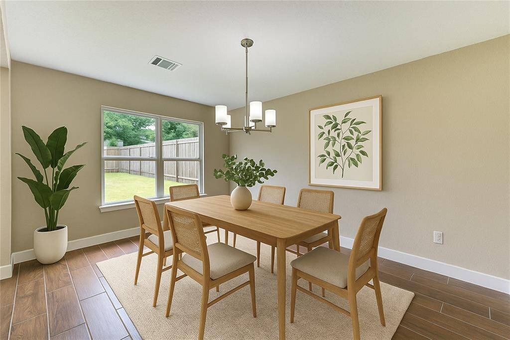 Virtually staged dinning room.