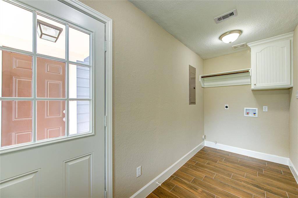 Check out the utility room located downstairs. Door leads to covered walkway to garage.