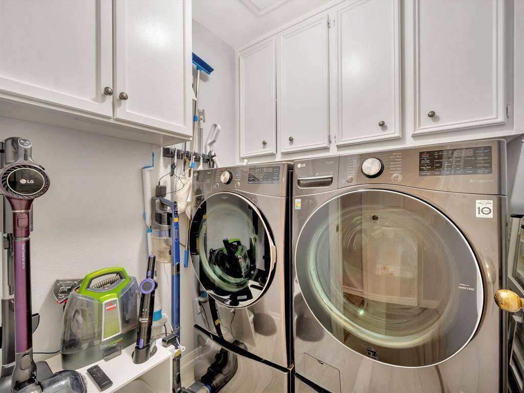 Walk-in tubs offer numerous benefits, primarily related to safety, accessibility, and comfort, especially for individuals with mobility issues or those who want to age comfortably at home. This one is accented with contempory glass lighting.  This bathroom also features roll in tub.