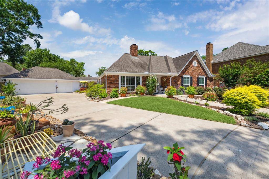 The home features a spacious 3-car garage, offering ample storage and functionality, including a converted, air-conditioned flex space. In addition, there is plenty of off-street parking available, providing convenience for multiple vehicles, guests, or recreational use.