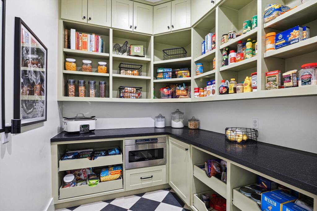 Check out this working pantry with plenty of additional prep space for parties and family events!
