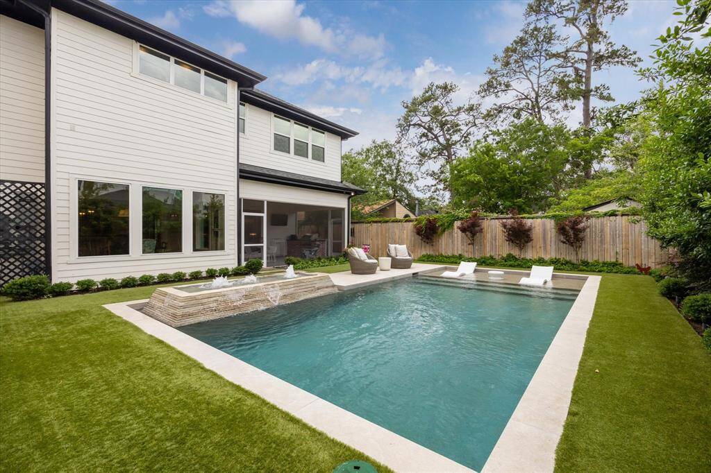 Imagine the tranquility of the water feature as you settle into your lounge chair!