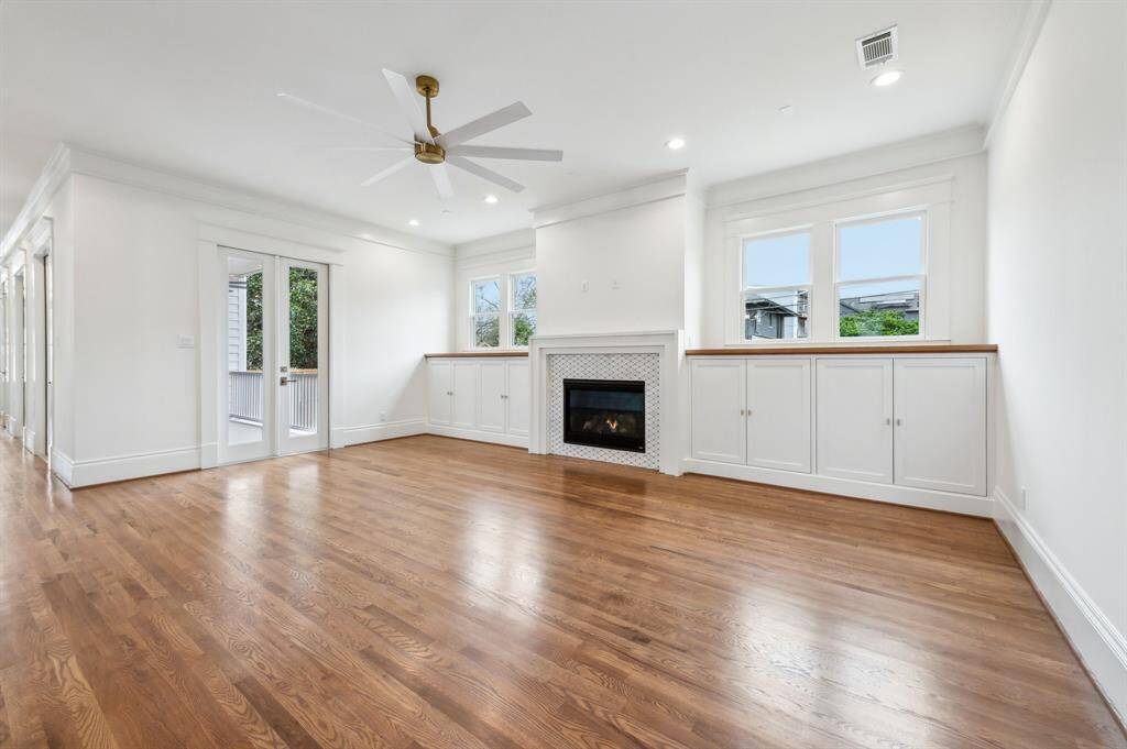 Family room in another corner lot Modern Bungalow home - Blount will enjoy same porch access through French doors.