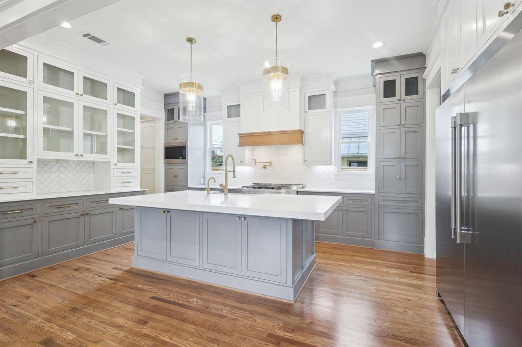 Kitchen in another Modern Bungalow corner lot home.