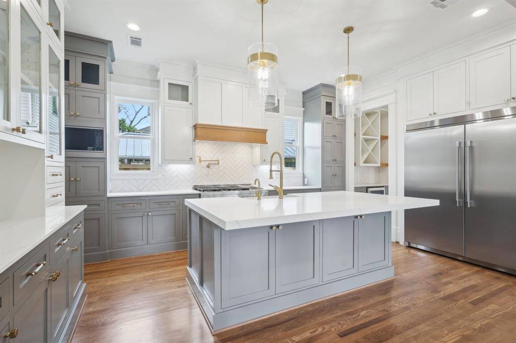 Kitchen in another Modern Bungalow corner lot home.