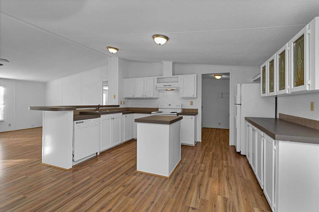 Loads of cabinetry in this spacious kitchen. Refrigerator included