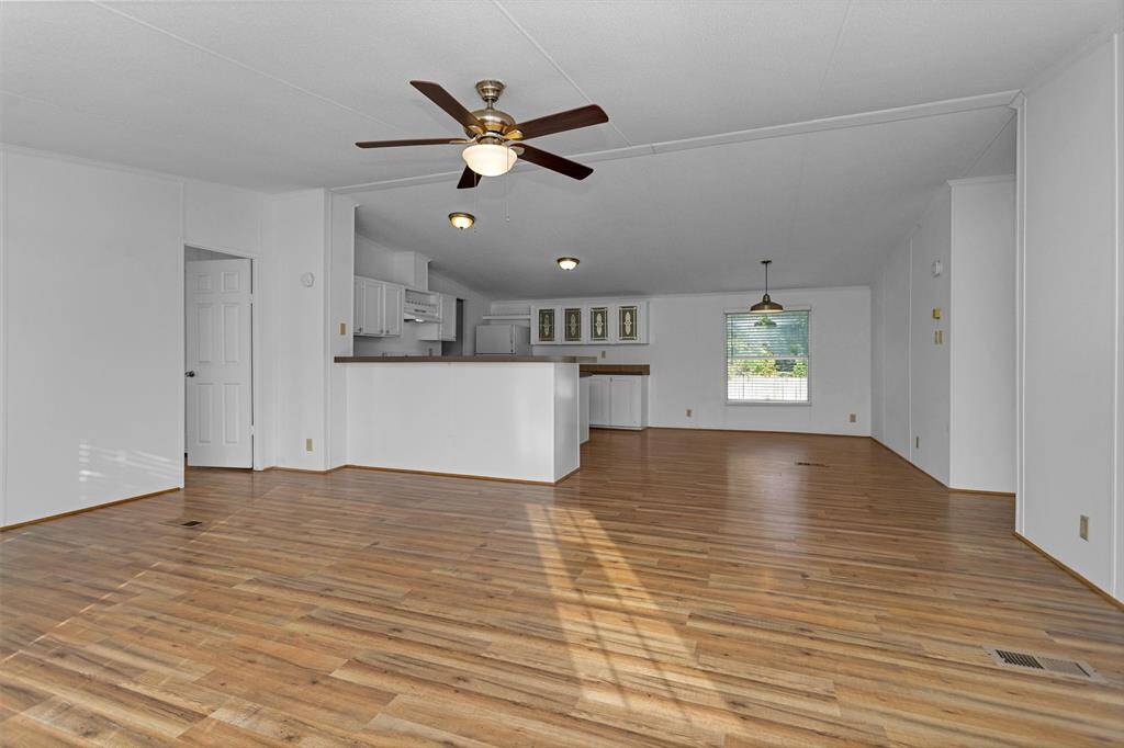 Living room is open to the kitchen and dining rooms