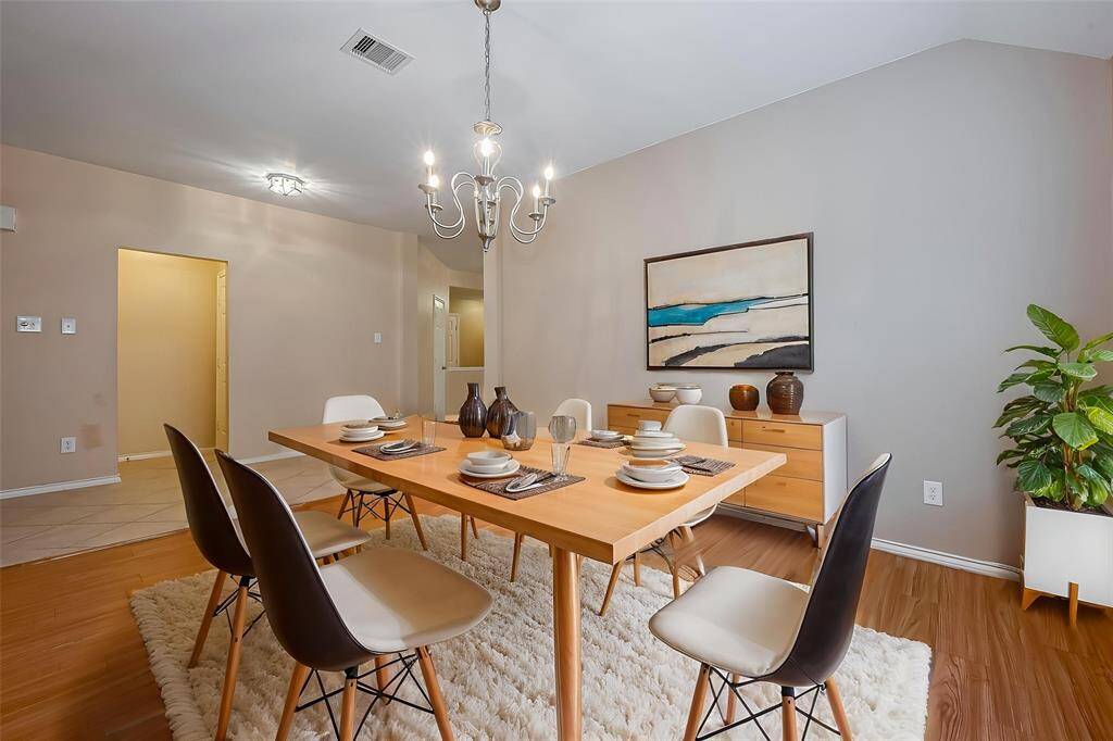 The grand formal dining area is the place to entertain family and friends. There is enough room for a full sized table and bar or buffet.
