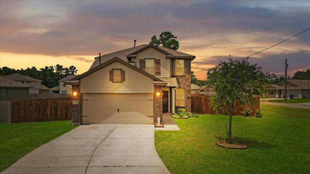 Curb appeal at its finest! This stunning 2-story home sits proudly on a spacious corner lot