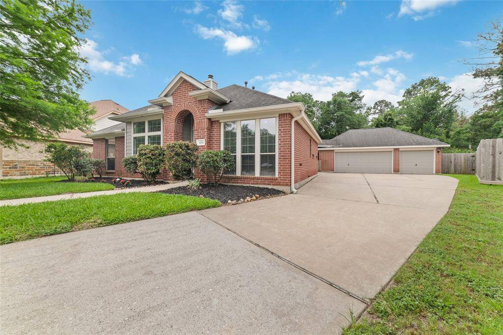 One story with 3 car garage on private lot