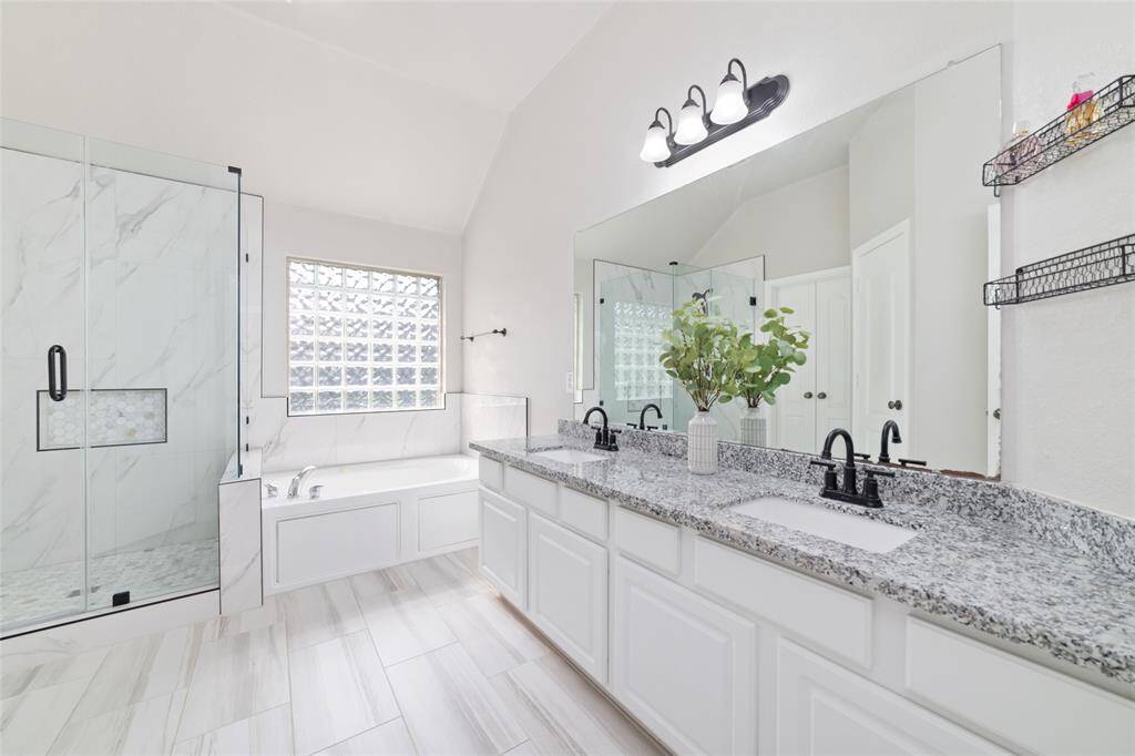 Primary bathroom has been remodeled