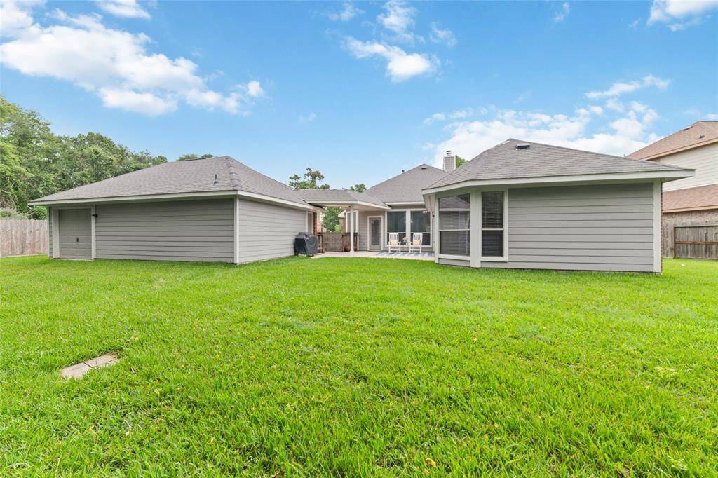 Notice the third bay garage has access to the backyard.