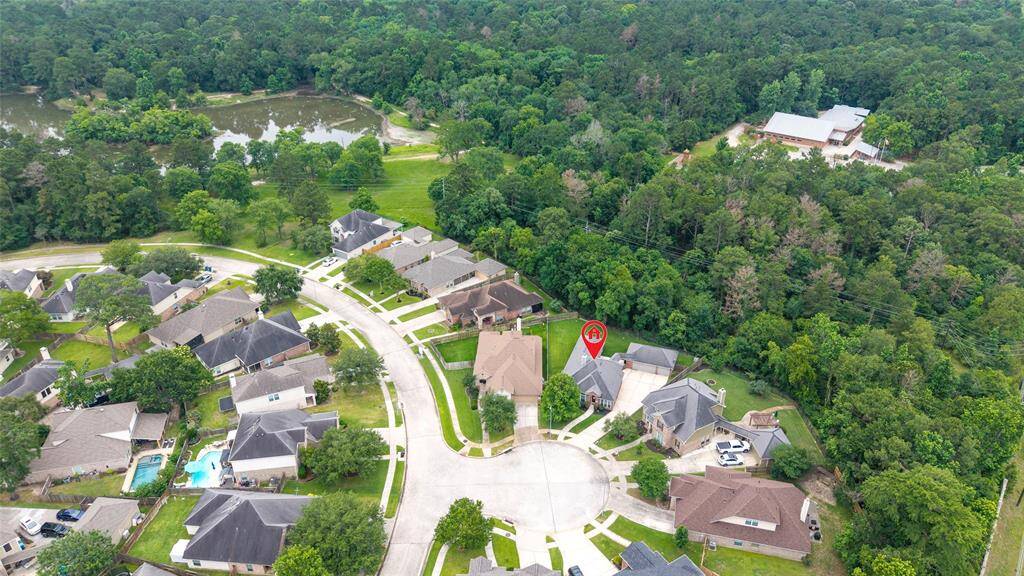 The house is steps from the pond, hiking trails, and nature center.