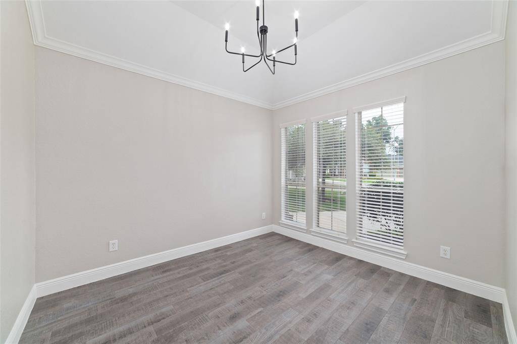 Formal dining room. Currently being used as a workout room.