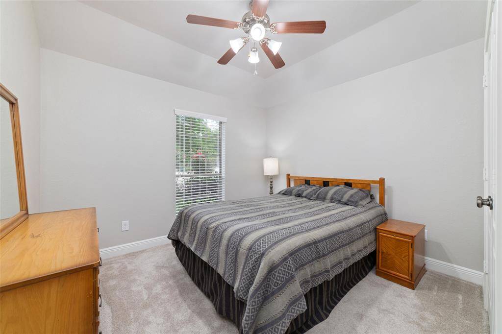 First of two secondary bedrooms in this split floor plan.