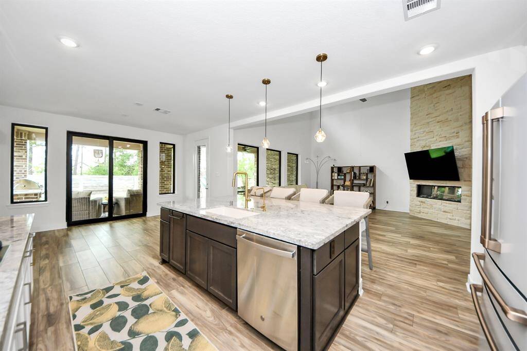Another view of kitchen showing patio through sliding doors.