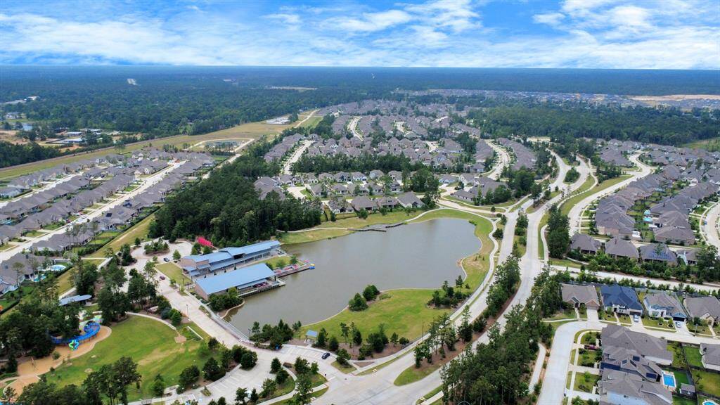 Expansive community center with restaurant, lake with paddle boats, playgrounds, splashpads and miles of trails.  HOA hosts many monthly community events and camps for kids.
