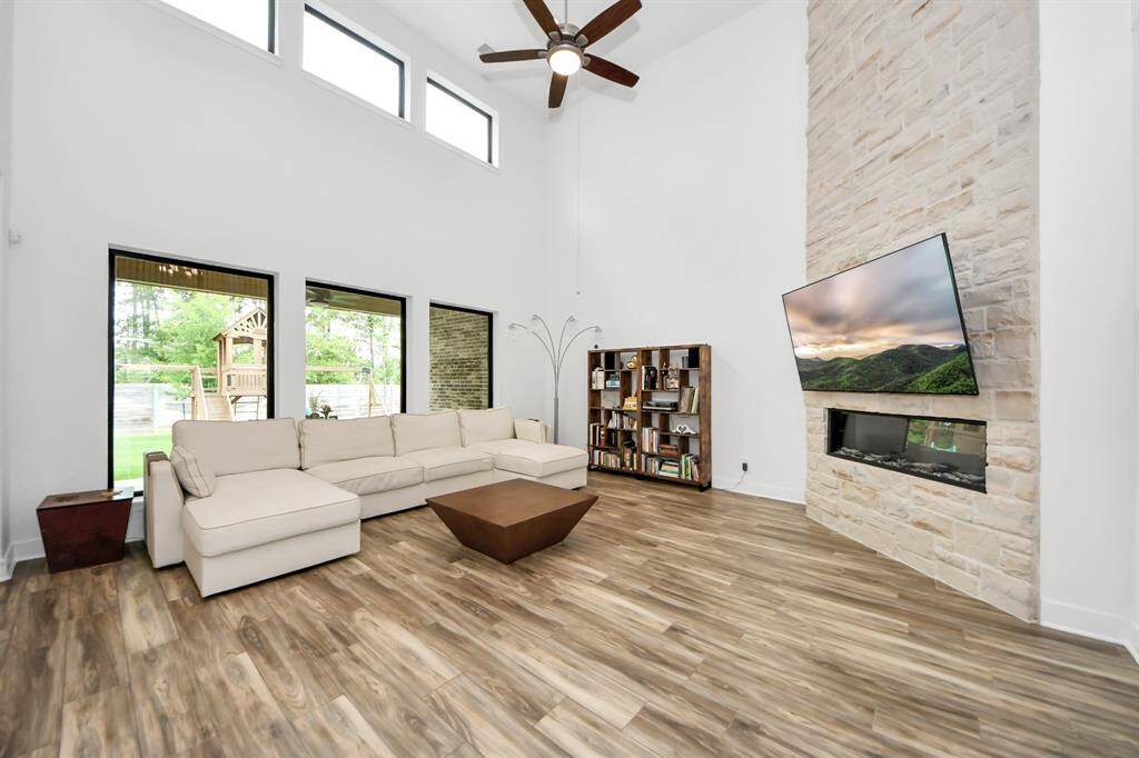 Family room with plenty of outdoor light.