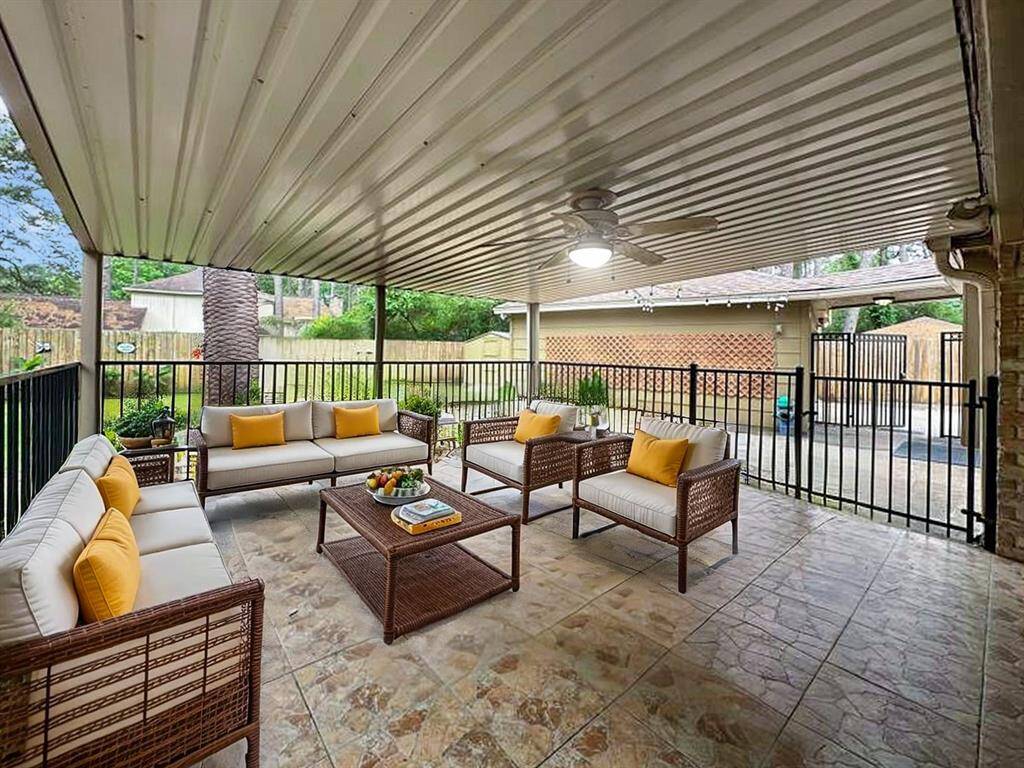 Outside, enjoy a covered patio with a lighted fan and an enclosure.VIRTUALLY STAGED
