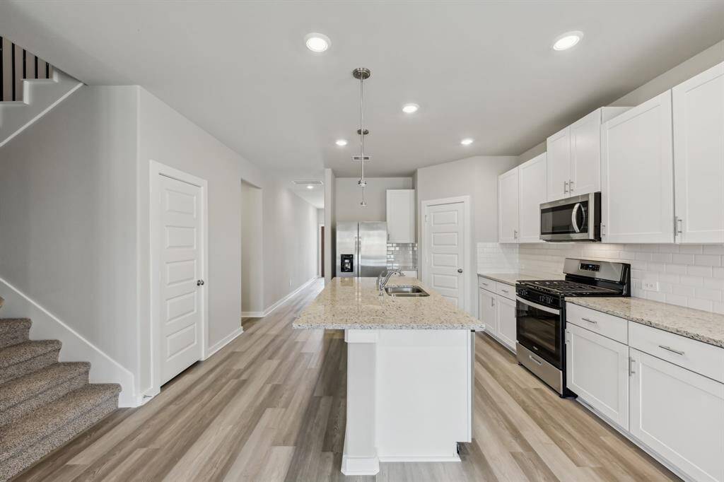 Photo is not of the actual home but is an inspirational photo of builder’s model home and may depict options, furnishings, and/or decorator features that are not included.