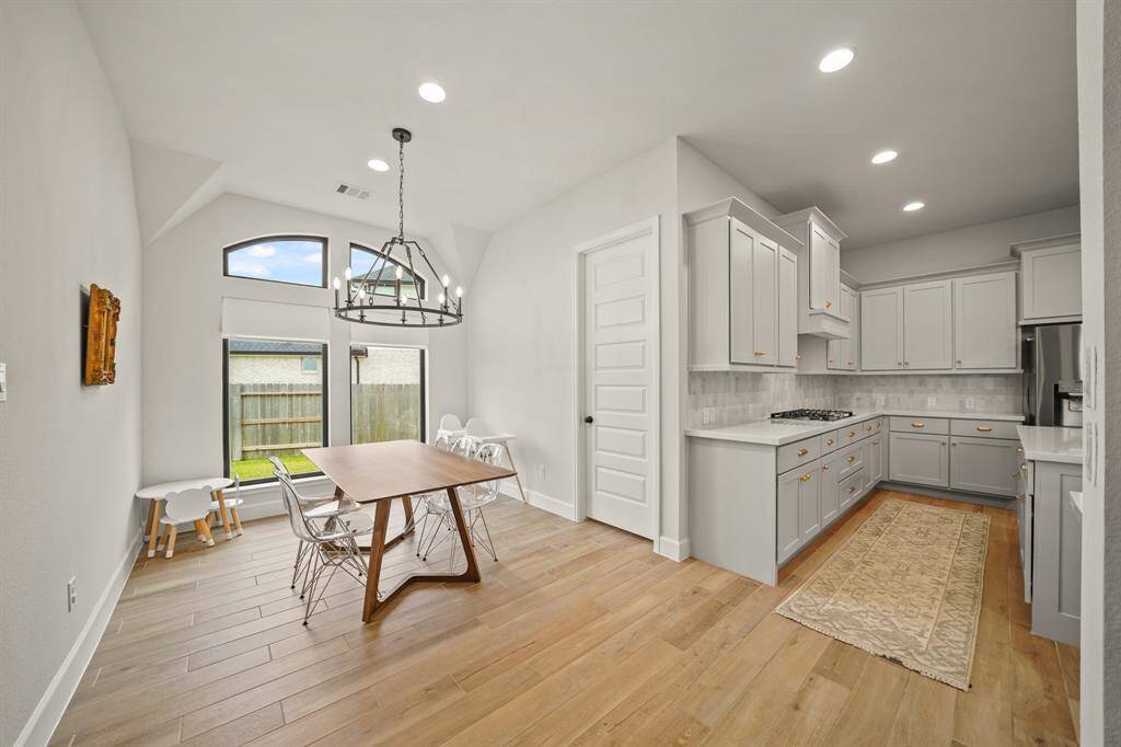 The Breakfast Room provides a sunny, comfortable nook adjacent to the Kitchen — ideal for quick meals or leisurely coffee.