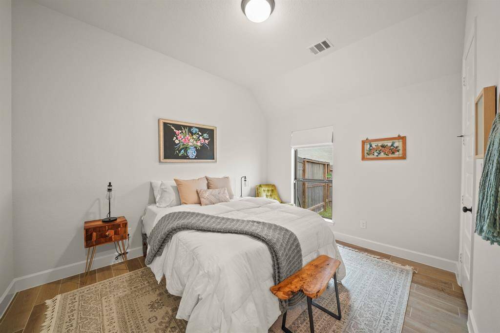 Bedroom #3 offers a comfortable space with natural light, a spacious closet, & plenty of room for various furniture arrangements.