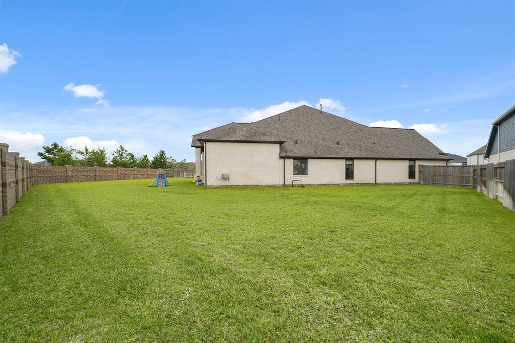 Step outside to a serene backyard offering ample space for outdoor gatherings, gardening, or relaxing under the stars. Backyard also provides a wonderful blank slate ready for you to make it your own.