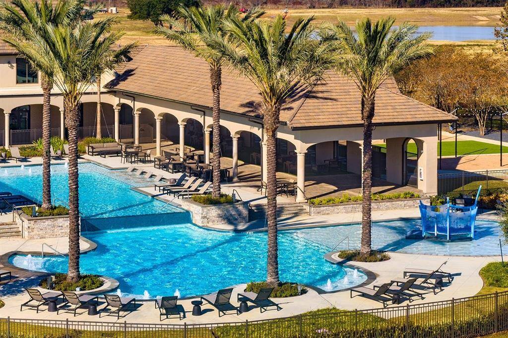 The Resort at Amira is the community hub, featuring a 7,000 sq. ft. clubhouse with fitness room, kids’ nook, kitchen, yoga studio, & onsite HOA. Enjoy lake-view patios with TVs & a pool with adult & kids’ areas.