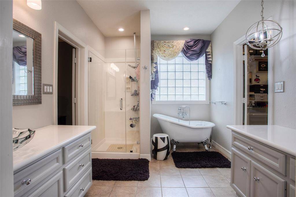 Lovely primary bathroom with separate shower and soaking tub.  Second vanity area is plumbed for another sink.