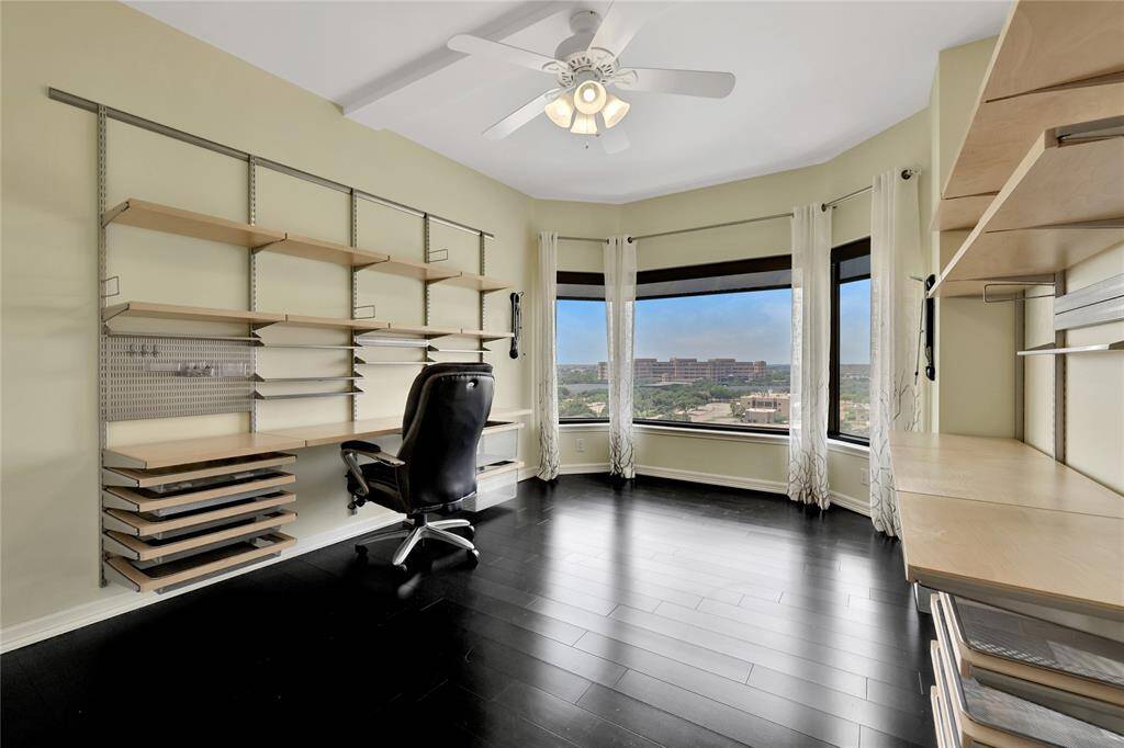 Working from home has never been so easy! There are two built-in desks with adjustable shelving and drawers. Notice the nice window that can accomodate an additional seating area.