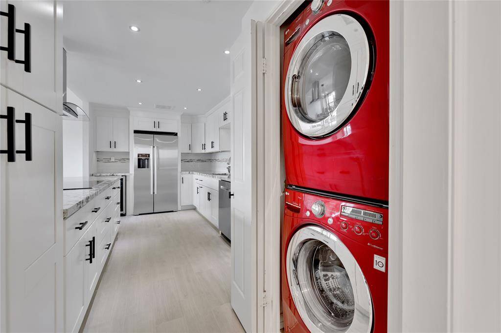 Front loading washer and dryer are included with the home.