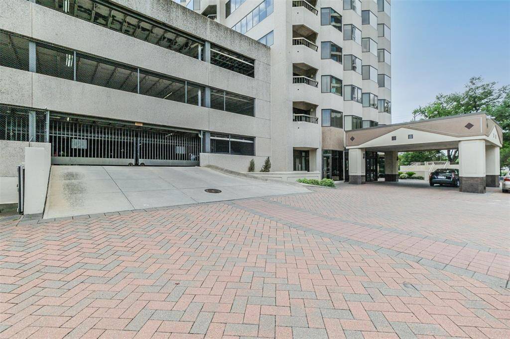 The parking garage has multiple levels and is attached to The Spires. This home has 2 reserved parking spaces.