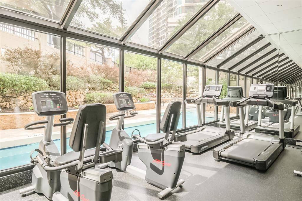 Staying physically active has never been easier when you don't need to leave your building. The fitness center features pretty views of The Spires pool.