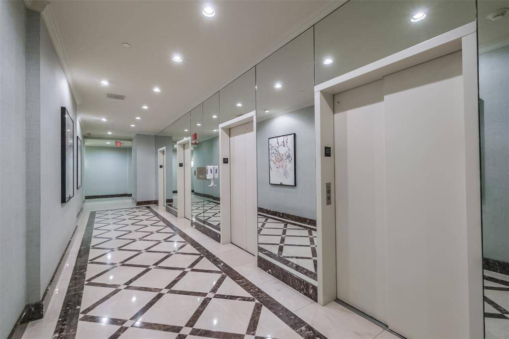 The common areas are maintained by The Spires Maintenance and Housekeeping Departments. This is a view of the hallway leading up to the elevators residents and guests utilize to access the indivdually owned homes.